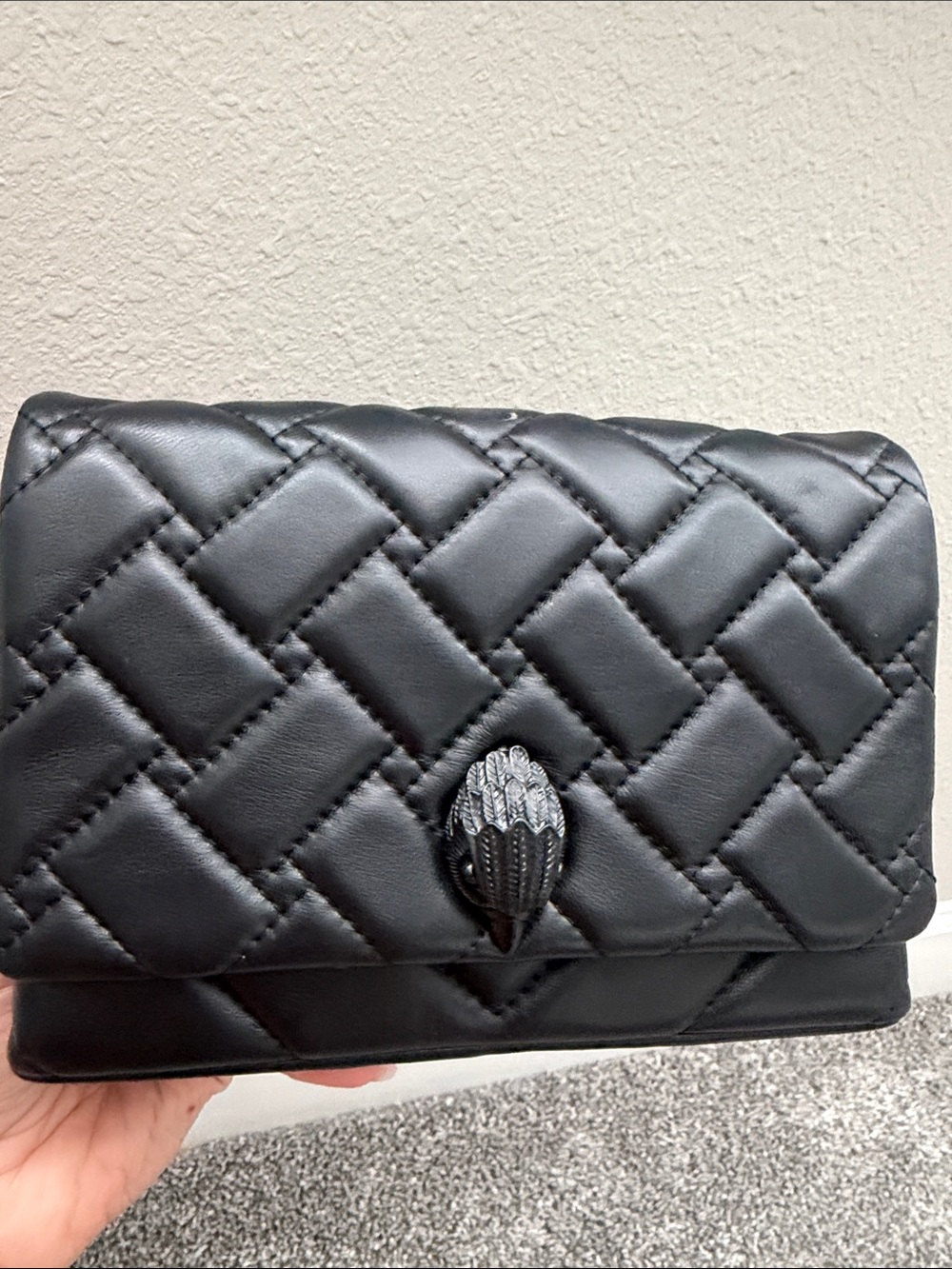 Quilted Black Leather Shoulder Bag with Decorative Clasp